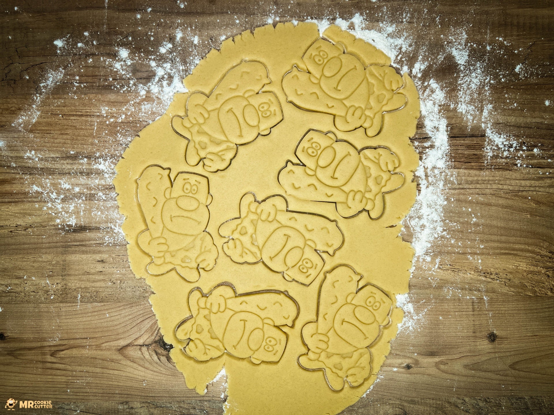 Caveman Cookie Cutter Shapes in dough