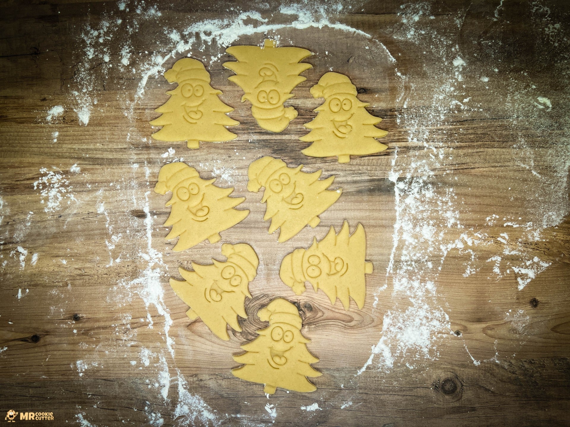 Christmas Tree Cookie Cutter Shapes on a wood worktop